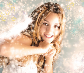 Merry Christmas: Beautiful  blonde woman with angel wings, stars and snowflakes :)