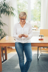 Happy businesswoman in a stylish office