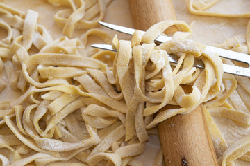 preparing egg tagliatelle at home