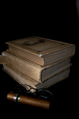 reading a book smoking a cuban cigar