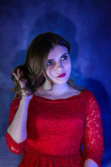 Fototapeta premium Fashion photoshoot on a dark background