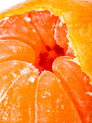 Ripe juicy tangerine. © Nikolay Popov