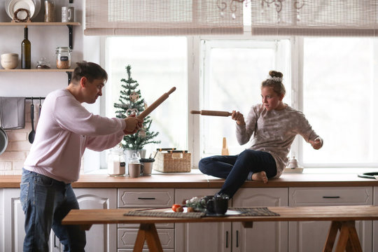 Dad And Daughter Teen Jokingly Fight In Kitchen