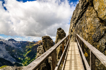 hiking in mountains - bridge to the sky