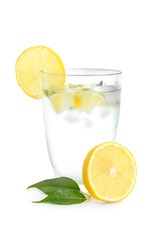 Glass of cool lemon water on white background