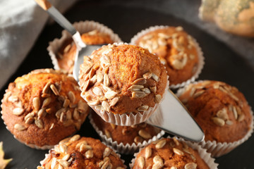 Delicious pumpkin muffins with sunflower seeds, closeup