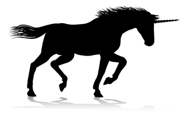 Fototapeta na wymiar A unicorn silhouette mythical horned horse graphic