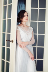 Fototapeta premium Beautiful bride girl wearing bridal dress