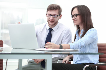business couple looking at laptop screen.photo with copy space