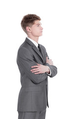side view.young businessman looking at copy space