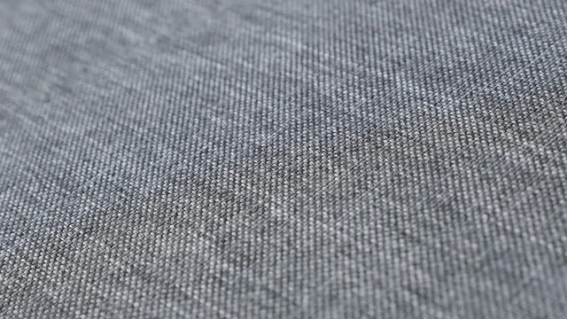 Detailed texture of upholstery fabrics close-up 4K panning video