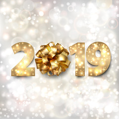 Happy New Year banner with gold numbers 2019 and a bow on a silver background with stars and twinkly lights