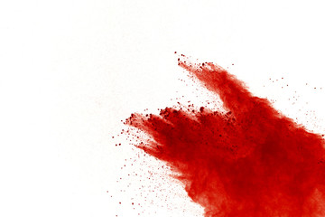 Red powder explosion on white background. Paint Holi.