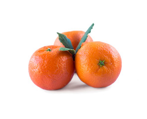 Mandarins with copy space for text. Ripe and tasty tangerines isolated on white background. Clementines on a white background. Background tangerines. 