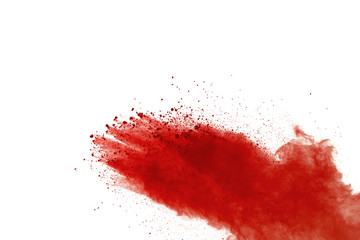 Red powder explosion on white background. Paint Holi.