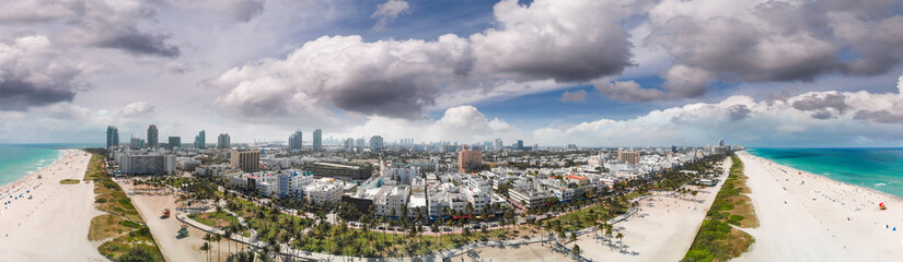 Fototapeta na wymiar South Beach in Miami at sunset. Panoramic aerial view of city and coastline