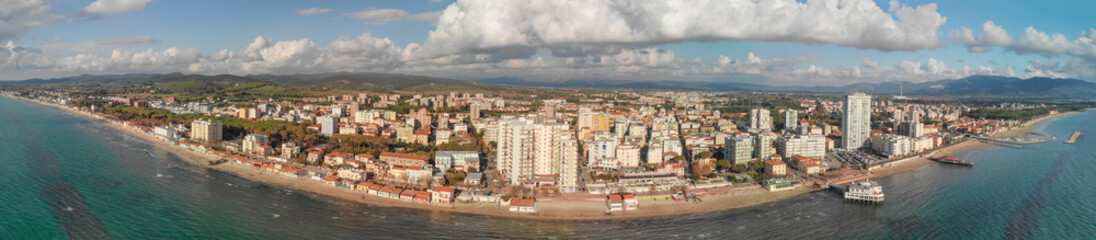 Obraz premium Panoramic aerial view of Follonica, Italy. Coastline of Tuscany with town and ocean