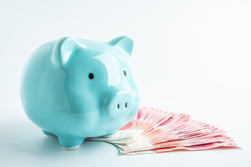 Saving money / piggy bank and money