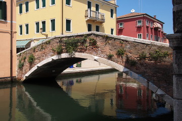 Romantic town of small Venice with old stone bridge