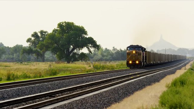 Diesel freight train locomotive near Chimney Rock Nebraska USA