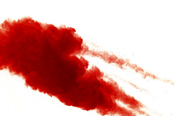 Red powder explosion on white background. Paint Holi.