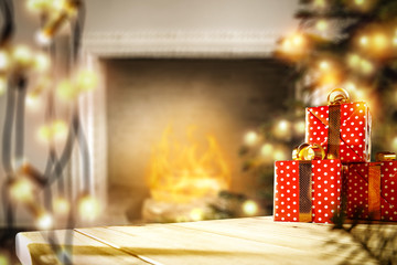 Naklejka na ściany i meble Table background with gifts and fireplace with christmas tree 
