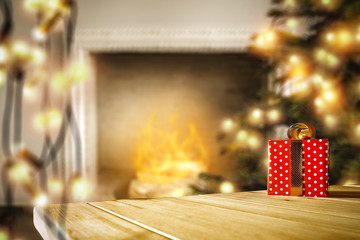Naklejka na ściany i meble Table background with gifts and fireplace with christmas tree 