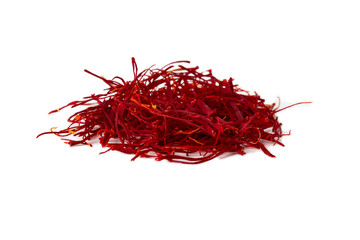 Naklejka premium Saffron spice threads (strands) isolated on white background