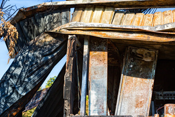 Burned damaged ruins of destroyed supermarket arson investigation insurance