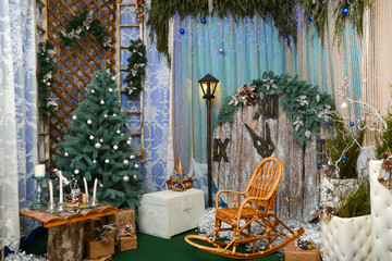 Beautiful photozone with the Christmas decor and Christmas decorations. Approaches as a background, the New Year's background, the Christmas background.
