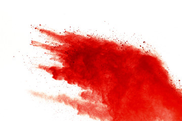 Red powder explosion on white background. Paint Holi.