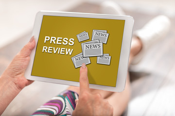 Press review concept on a tablet