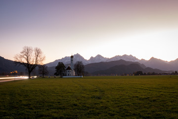 Beautiful St. Coloman church near Neuschwanstein castle at dusk 