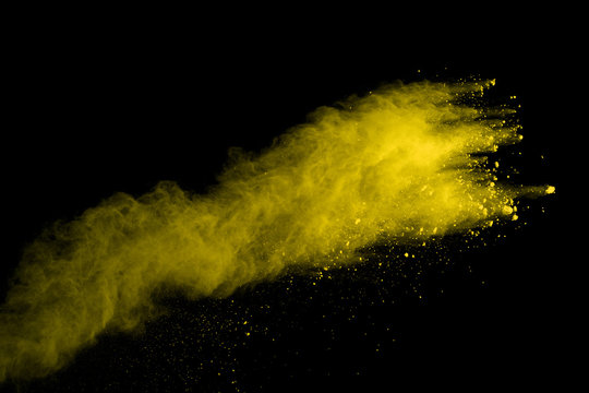 Gold Powder Particles Explosion. Glitter Burst With Golden Texture. Yellow Color Dust Splash For Fashion Background.