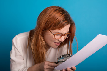 young girl controling paperwork