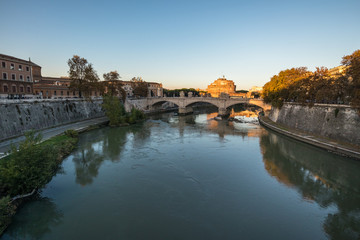 View of Castel Sant'Angelo in Rome at Sunset from the River Tiber and its Natural composition