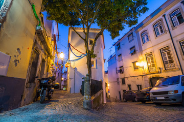 Fototapeta na wymiar Night shot of city street near Dom Luis I bridge in Porto, Portugal