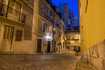 Fototapeta na wymiar Night shot of city street near Dom Luis I bridge in Porto, Portugal