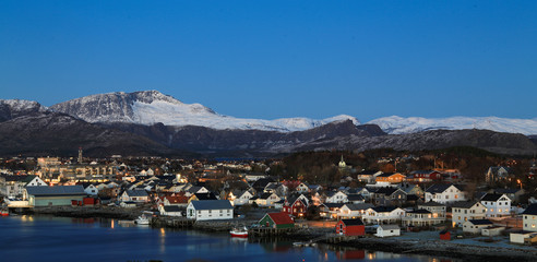 Fototapeta premium After sunset from Bronnoysund Bridge, overlooking the city, Northern Norway