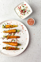 Healthy roasted carrots On white background