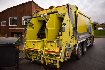 Loading garbage in the garbage truck. Garbage removal. Work garbage collector. Rogaland. Norway. 