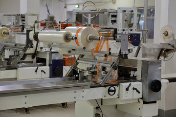 Industrial equipment and machinery at the factory of bread and sweets