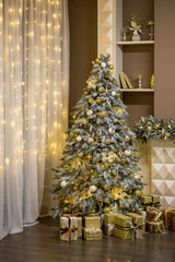 Christmas tree in golden color, decor, studio