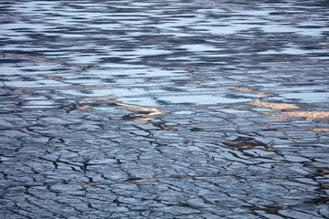 ice on the pond. water freezing