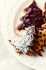 Gingerbread cookies for Christmas on a plate. Close-up