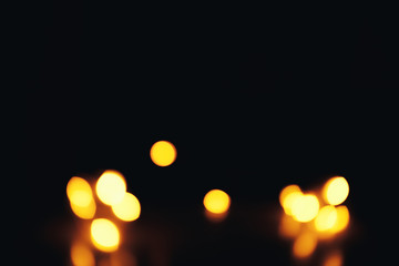 Defocused gold abstract christmas background. Bokeh. a little bit in corner