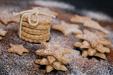 Christmas cookies with flour and cocoa topping