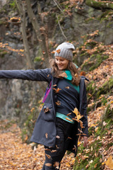 woman in autumn forest 