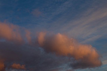 clouds illuminated by the setting sun, shot in late autumn