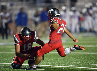 High School Football player in action during a game in South Texas